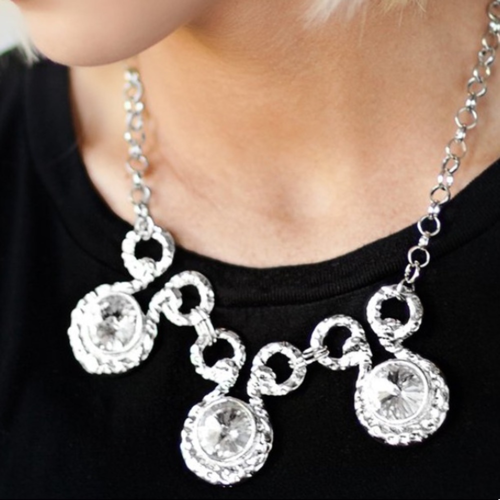 SOLD Silver jeweled necklace and earrings set.